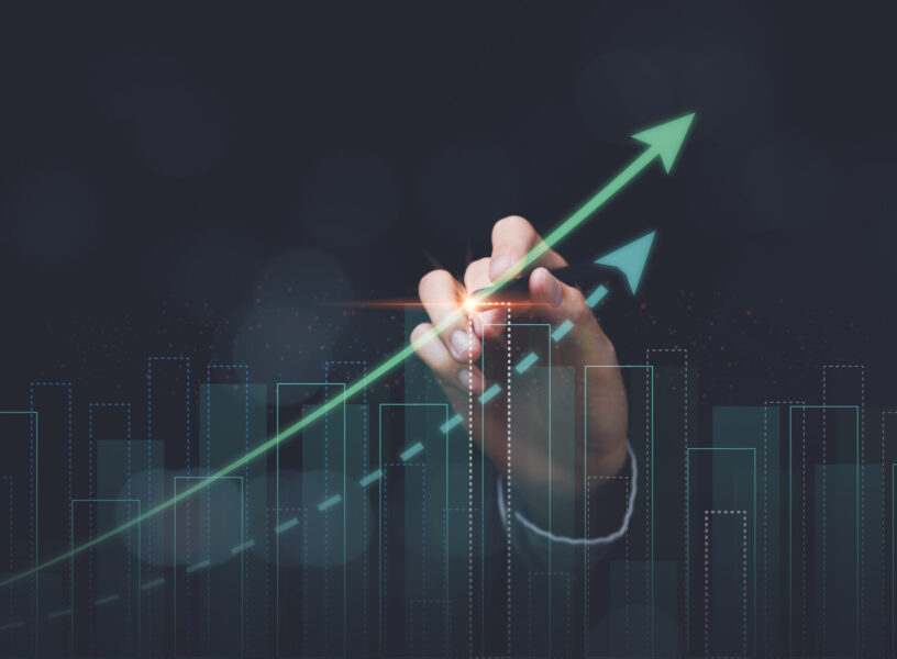 Businessman showing business growth and success graph ,concept of progress in development , financial efficiency and investment ,business strategy for goals ,future industry growth opportunities